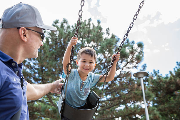 istock Little boy in swings 603162608