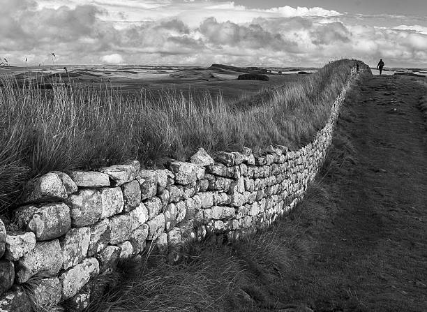 Bright September day in 2016 walking eastward direction along Hadrian's Wall footpath west of Housesteads Roman fort.