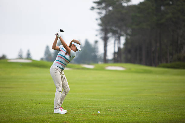 istock Perfect golf shot by a young female golfer 603167364
