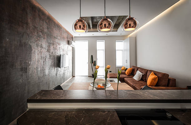 istock View from kitchen to living room in modern flat interior 603167414