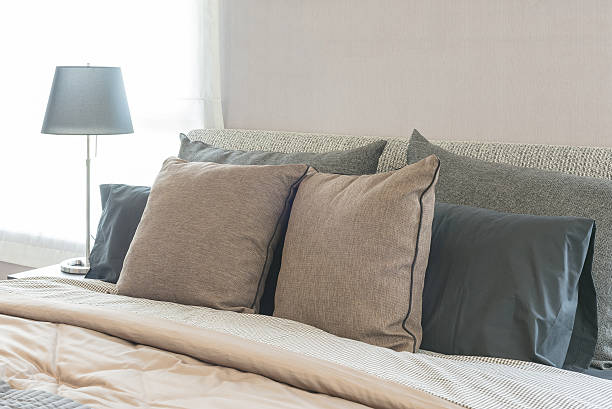 istock set of pillows on modern bed in bedroom design 603168342