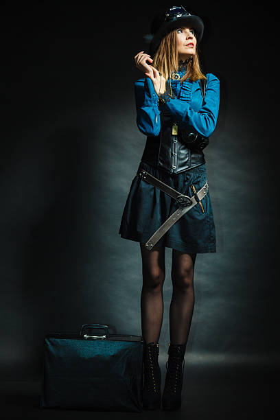 istock Steampunk girl with retro bag. 603168890