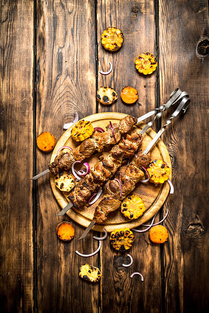 istock Shish kebab with grilled vegetables. 603171586