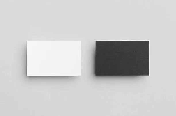 Photo of Black & White Business Card Mock-Up (85x55mm)