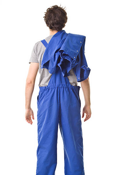 istock Repairman back portrait with uniform after work. 603175998