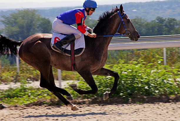 istock Jockey on horse. 603176562