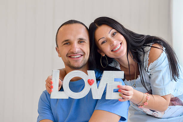 istock Young couple on in love at home, standing 603176814