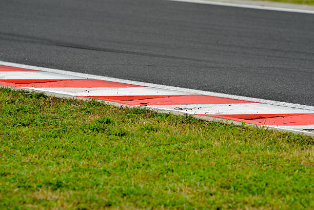 istock View from the pole position in a racetrack. 603177032