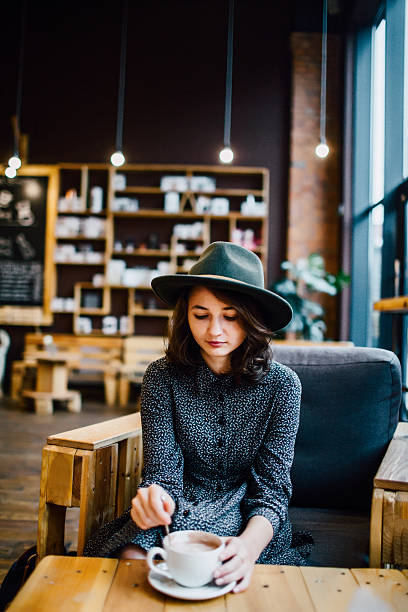 istock Girl in coffee shop 603177896