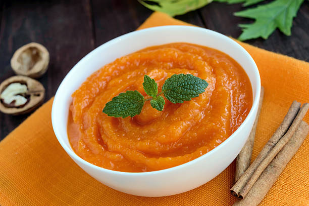 istock Organic pumpkin puree (soup) in a white bowl 603178520