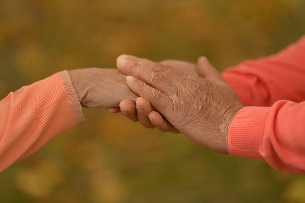 istock Couple of hands together 603179458