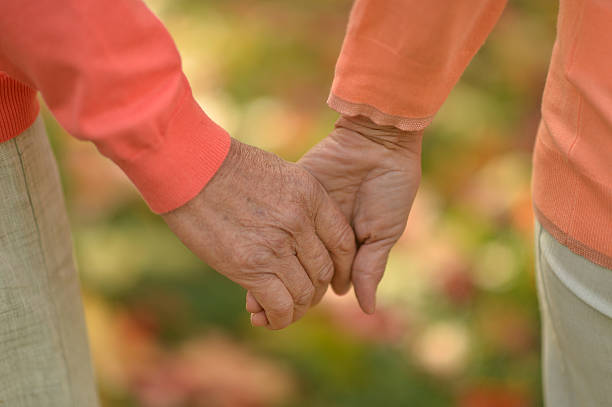 istock Couple of hands together 603182942