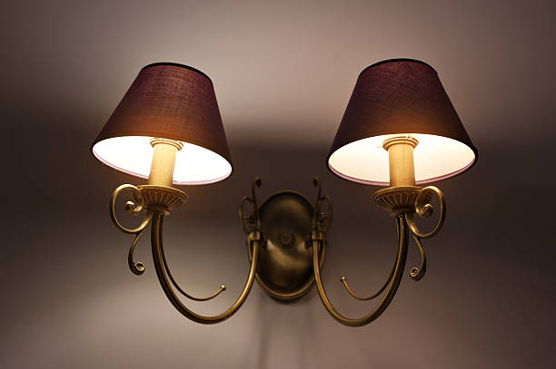 istock Two Wall lamps with yellow shade from canvas 603183162