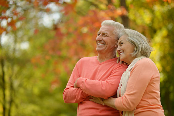 istock Senior couple in autumn park 603183380