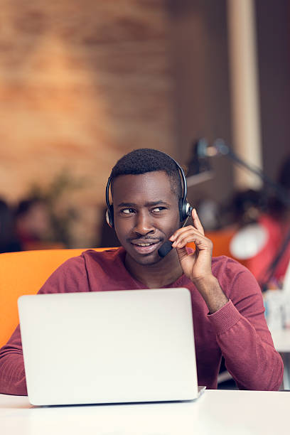 istock Customer Service agent in an startup office with laptop 603183892