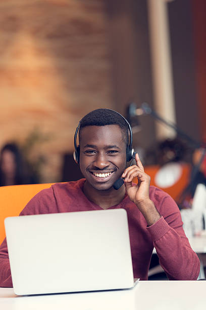 istock Customer Service agent in an startup office with laptop 603183982