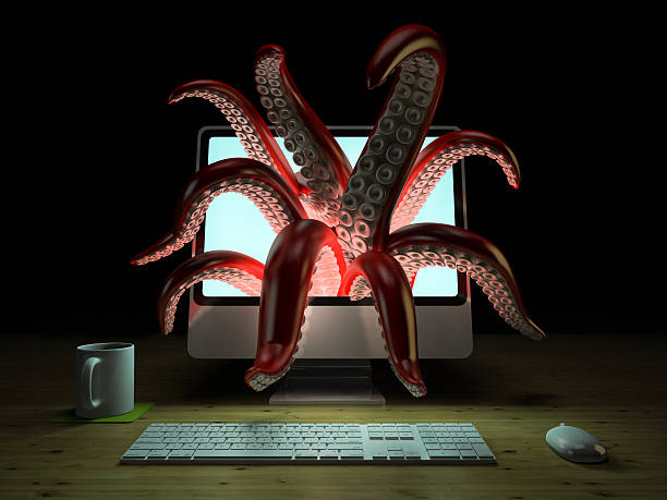 istock Red tentacles getting out of the computer monitor 3D rendering 603184160