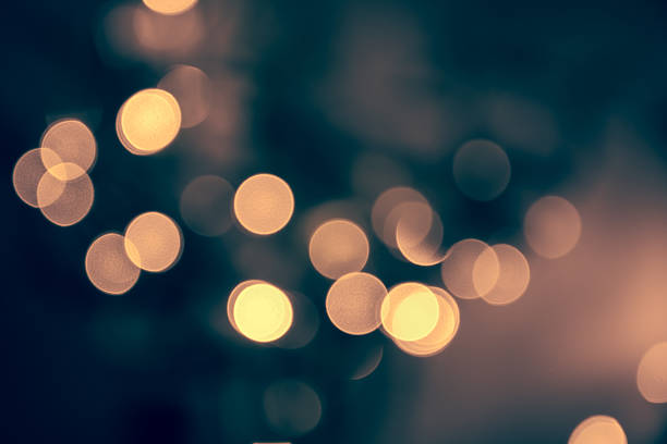 Blue toned blurred chrismas  background  with street lights