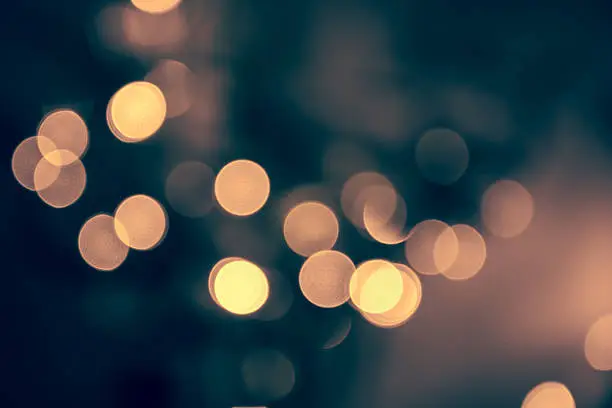 Photo of Blue toned blurred chrismas  background  with street lights