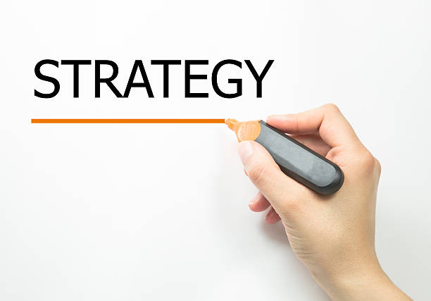 istock Hand writing Strategy with marker on transparent wipe board. 603186352