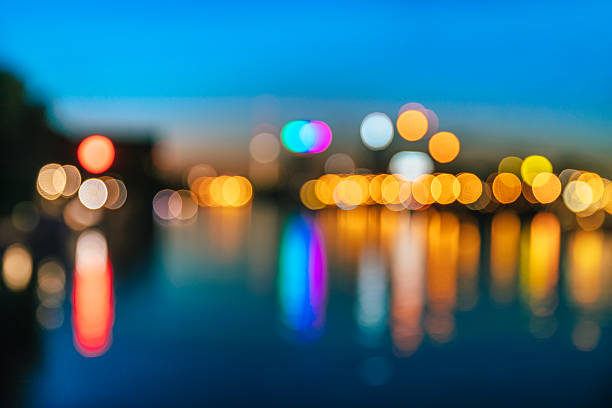 istock Defocused Image Of City At Night, water reflection 603187076