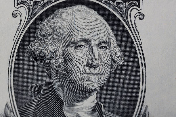 istock Close up to George Washington portrait on one dollar bill 603187794