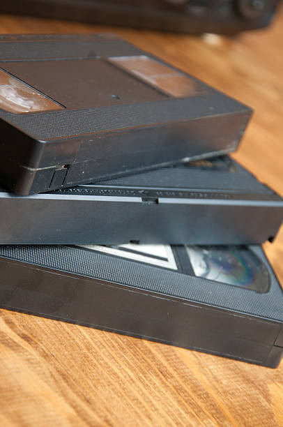 istock VHS cassettes on a wooden table 603187824