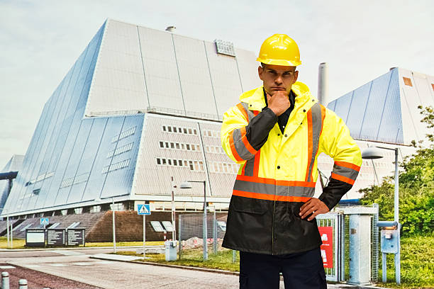 istock Worker standing in front of power station 603188246
