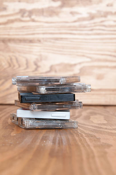 istock Cassette tape on a wooden background 603188418