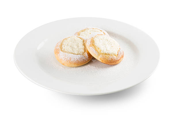istock cheesecakes on white plate isolated on the white background 603189424