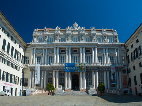 Genoa, Italy - August 13, 2016 : Neoclassical main Facade of Doge's Palace  (Palazzo Ducale) from piazza Matteotti