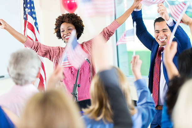 istock Female candidate celebrating win during city government election 603191654