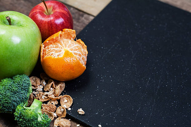 istock Healthy foods themed scene with fruit and vegetables. 603193736