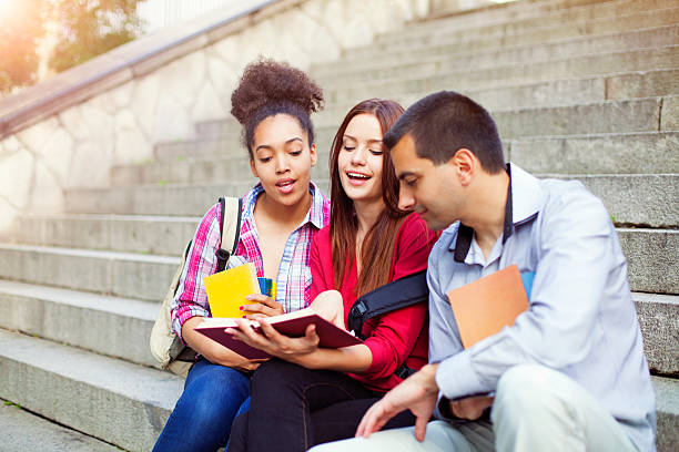 istock Students outdoor with books 603194028