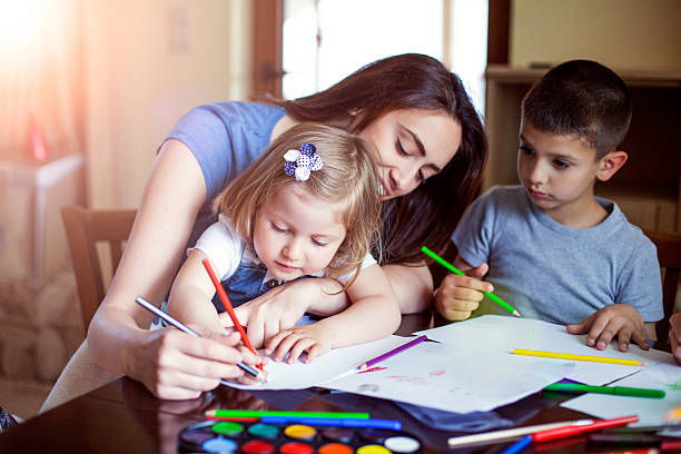istock Family drawing together 603194338
