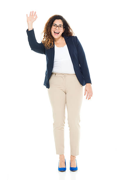 istock Cheerful businesswoman waving hand 603194424