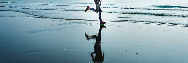 istock Running Exercise Training Healthy Lifestyle Beach Concept 603196444