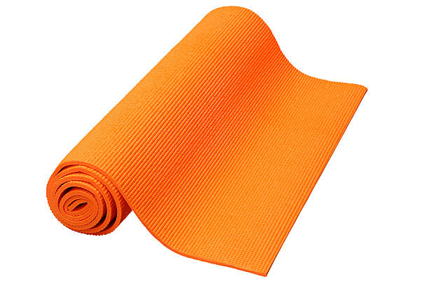 istock Orange Yoga Mat With White Background 603197796