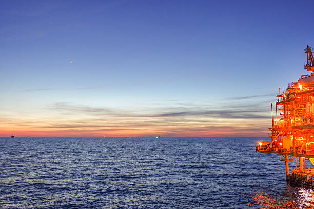 istock Sun set at the sea from offshore platform 603198564