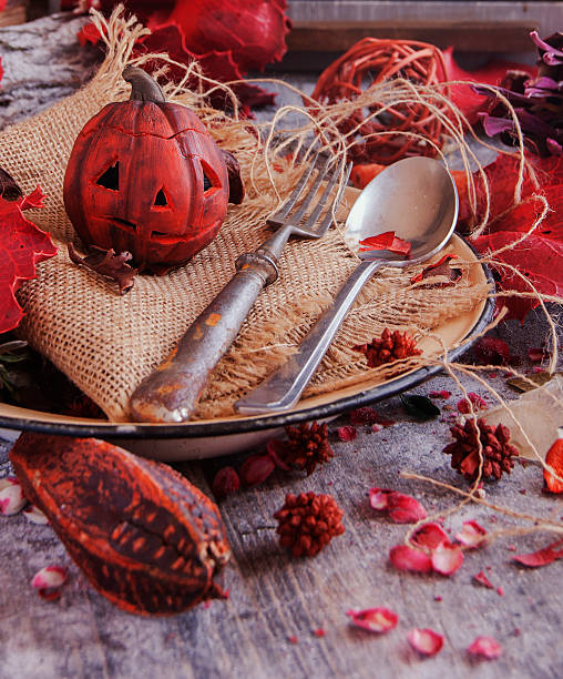 istock decorative pumpkin for Halloween with dried flowers 603198770