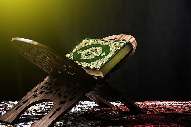 istock Koran - holy book of Muslims, sunlight effect filter 603199104