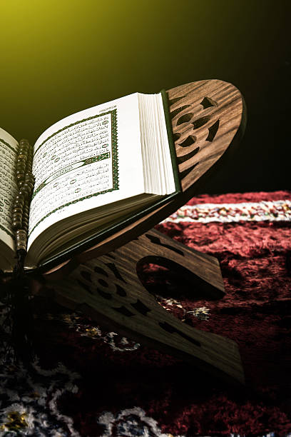 istock Koran - holy book of Muslims, sunlight effect filter 603199152