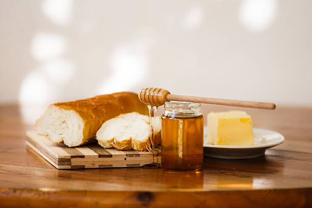 istock Fresh Breakfast - Honey, Butter and Bread 603250024