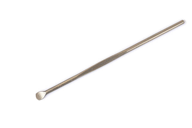 istock Close up metal earpick isolated on white 603250184