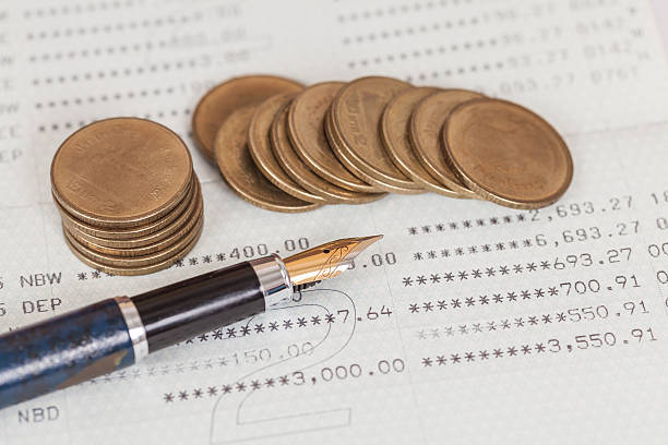 istock coins money on book bank 603252028