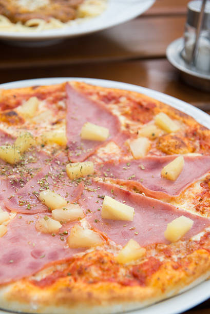 istock Tasty pizza with ham and cheese. Selective focus. 603254344