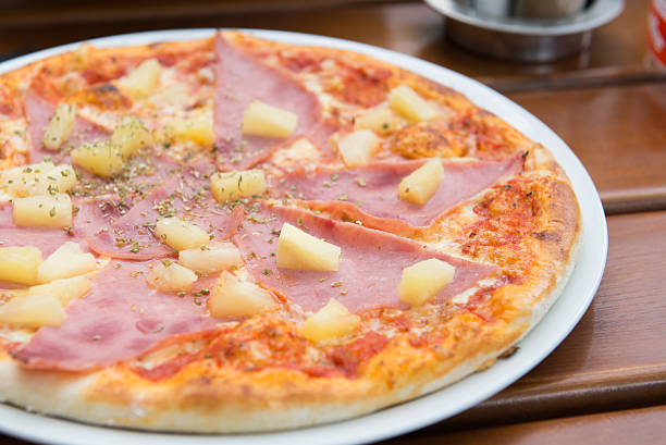 istock Tasty pizza with ham and cheese. Selective focus. 603254380