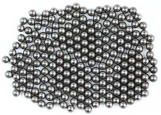 istock Shotgun pellets on white background 603255638