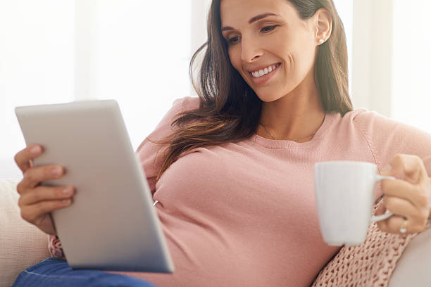 istock Making sure she’s relaxed and well researched during pregnancy 603256548