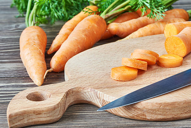 istock Fresh carrot and knife 603257026